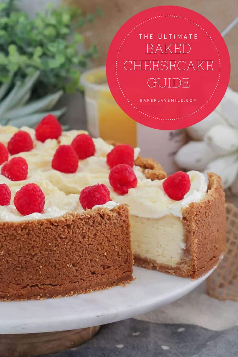 A slice of lemon baked cheesecake with raspberries being removed from a cheesecake. 