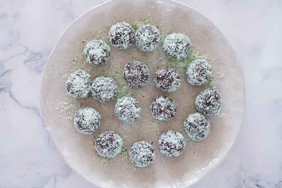 Green coconut coated chocolate balls.