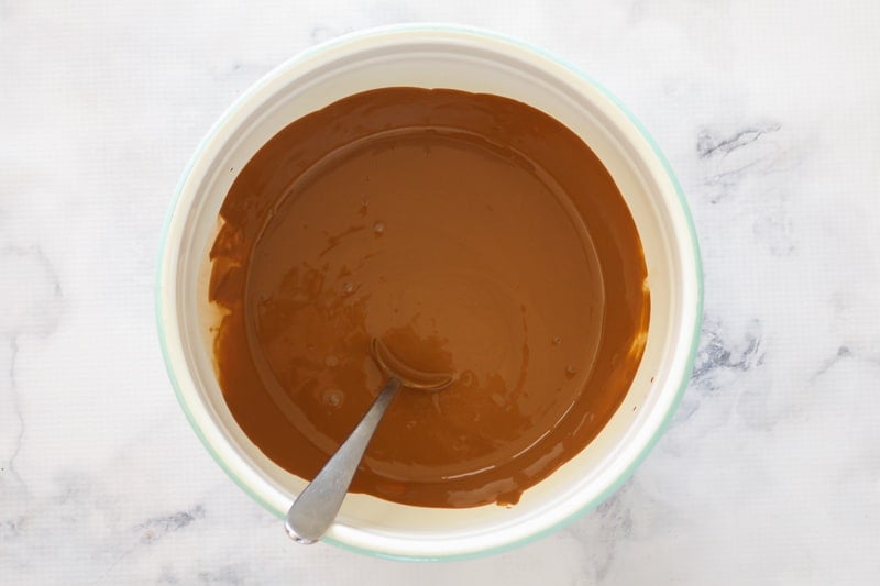 Melted milk chocolate in a bowl.