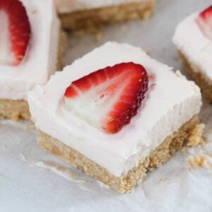 A simple and delicious no-bake Strawberry Cheesecake Slice recipe made from just 5 ingredients... the perfect no-fuss dessert!