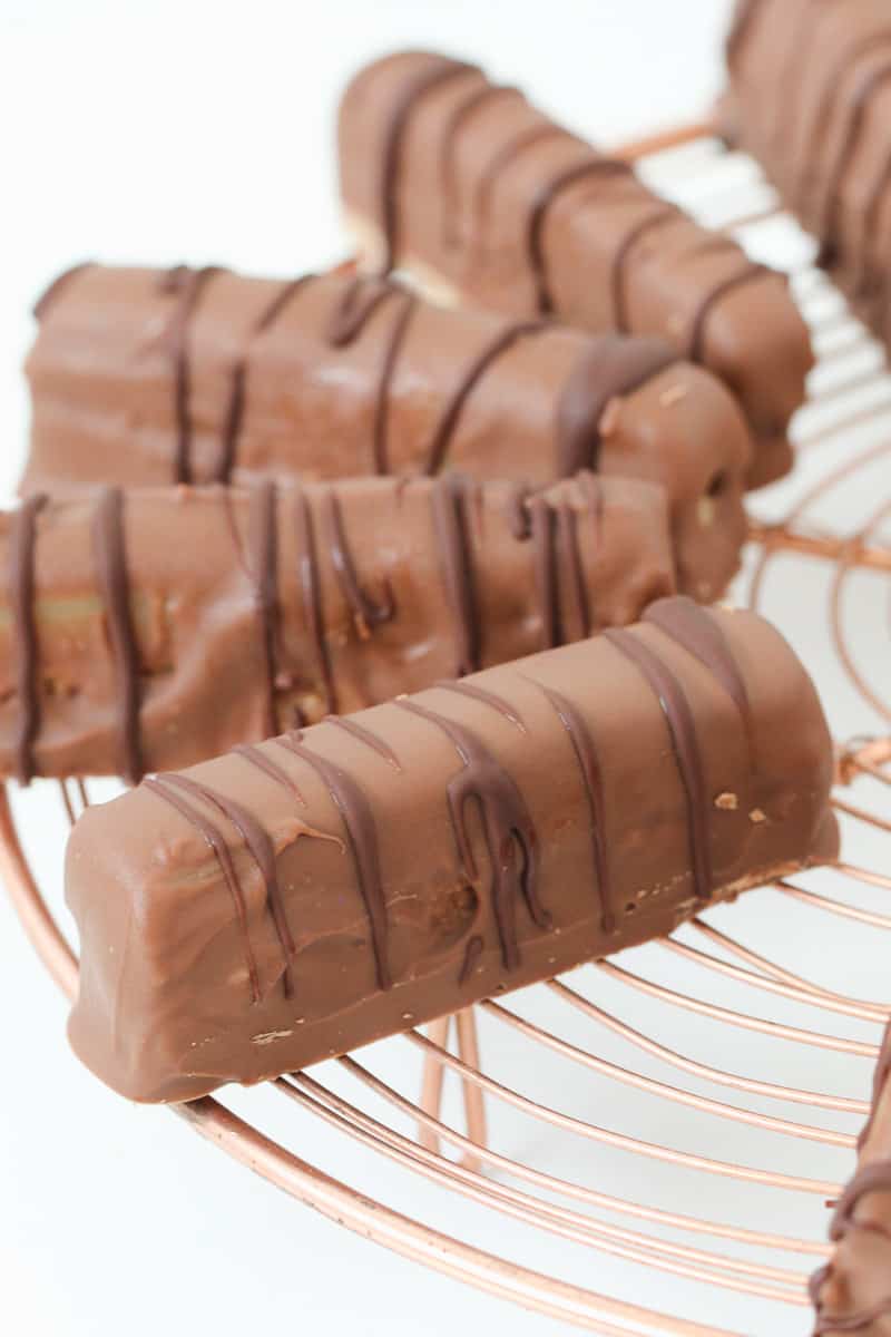 Chocolate coated sticks on a copper wire base.