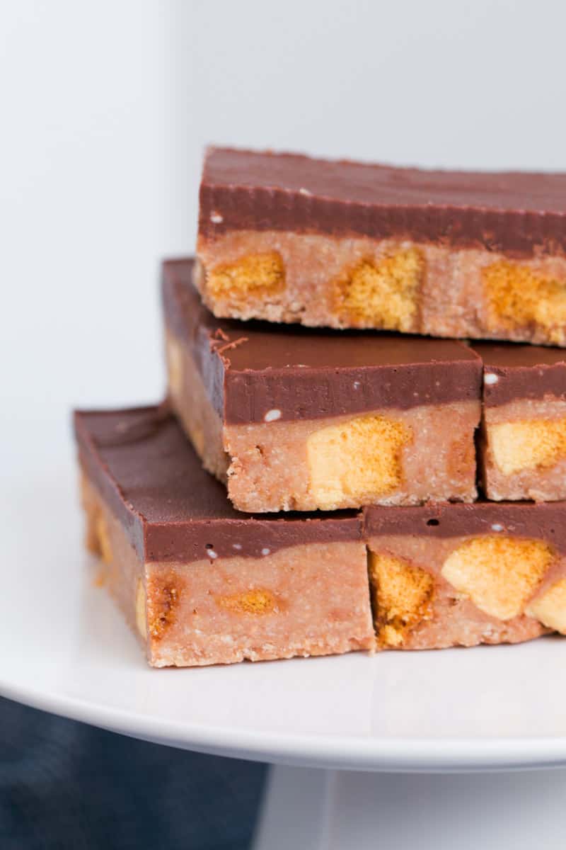 Chunks of honeycomb in a no-bake biscuit slice with chocolate.