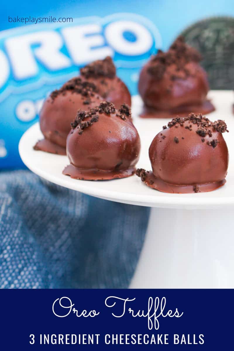 Chocolate cheesecake balls on a plate with a packet of Oreos in the background.