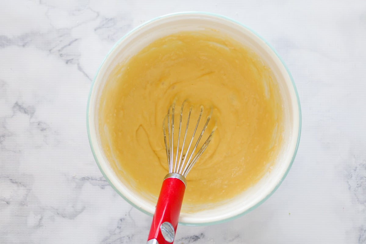 Flour and eggs mixed together in a bowl.