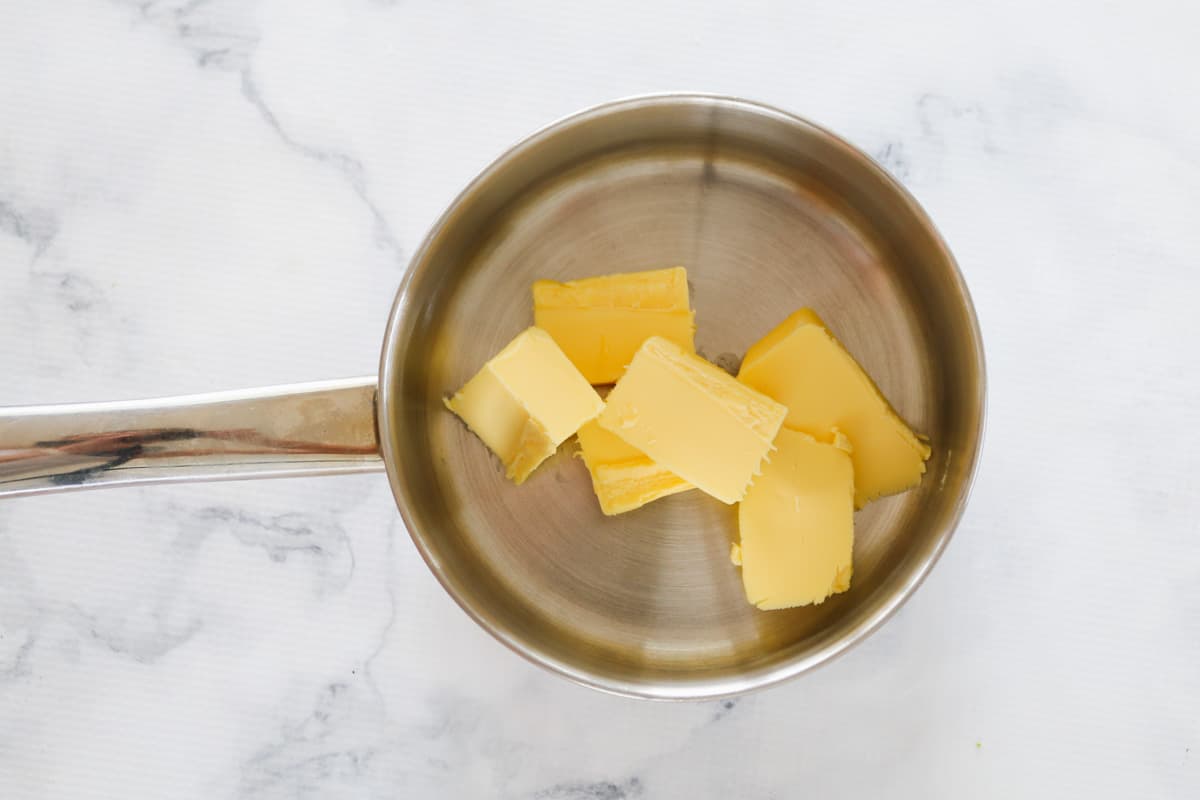 Butter in a saucepan.