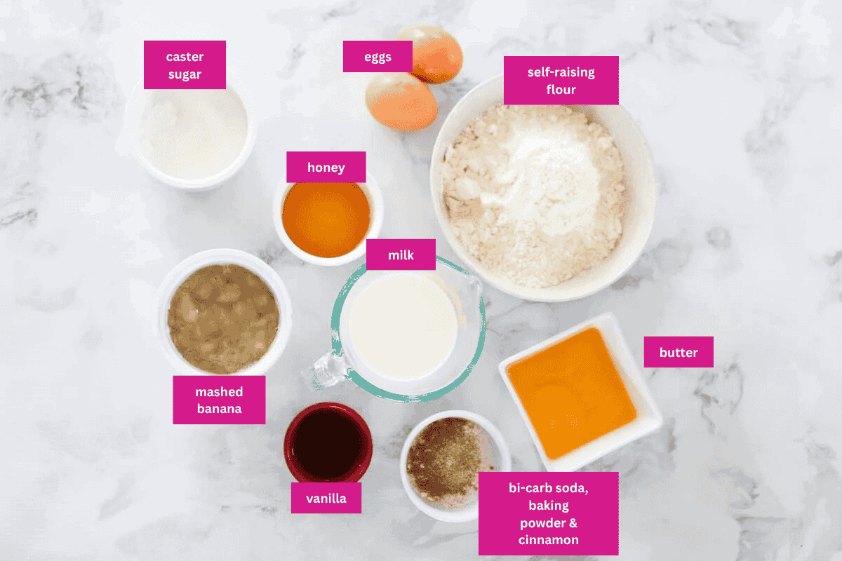 The ingredients for banana muffins in small bowls.