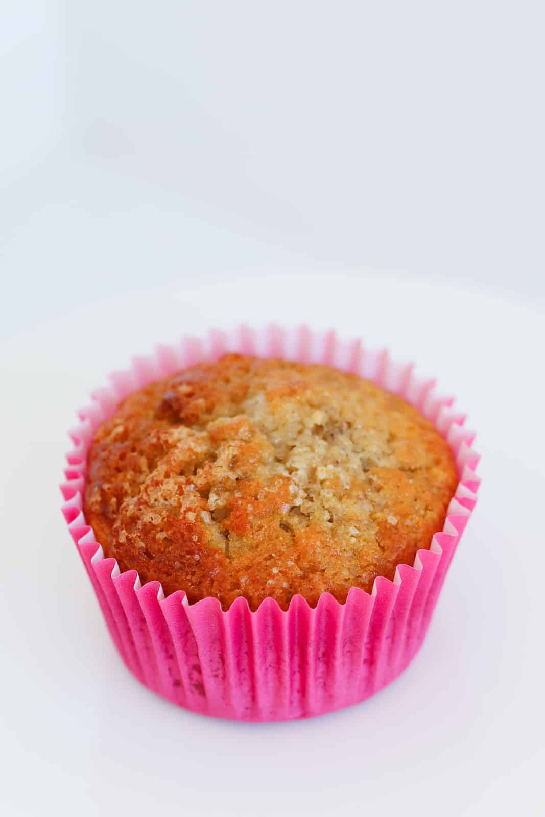 A banana muffin with choc chips.