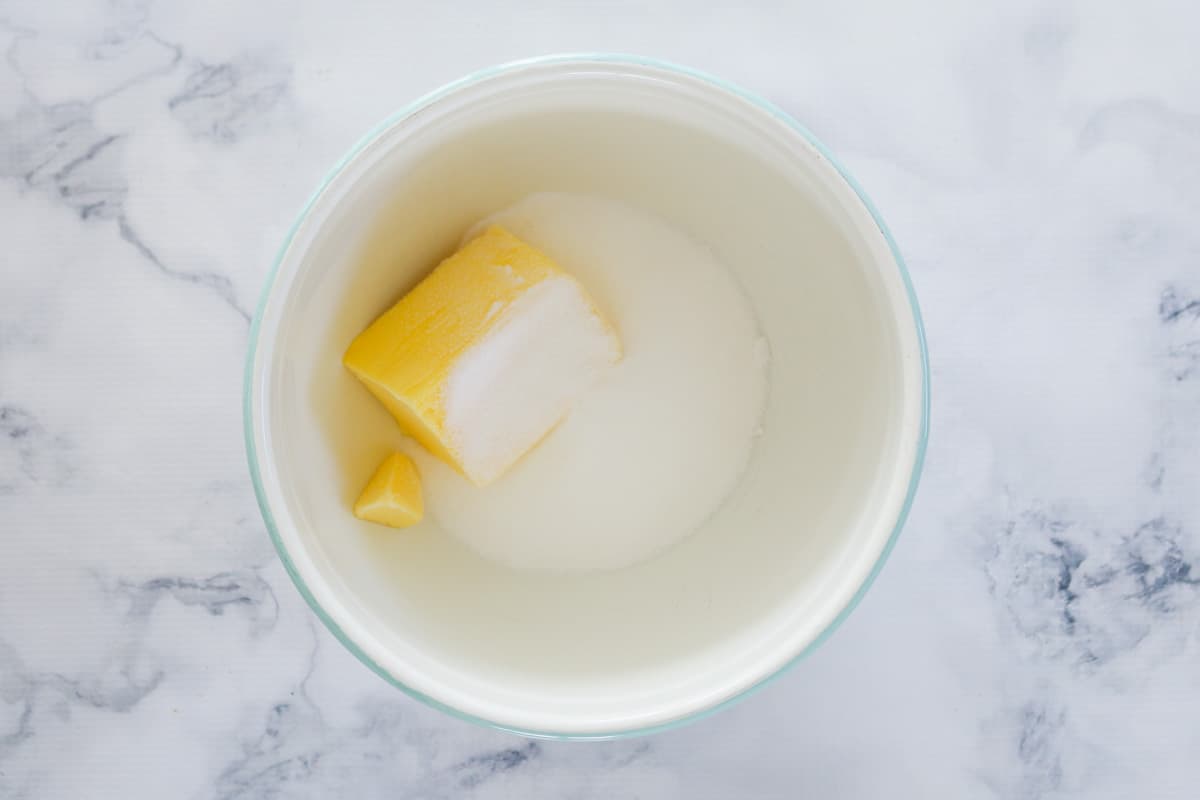 Butter and sugar in a bowl.