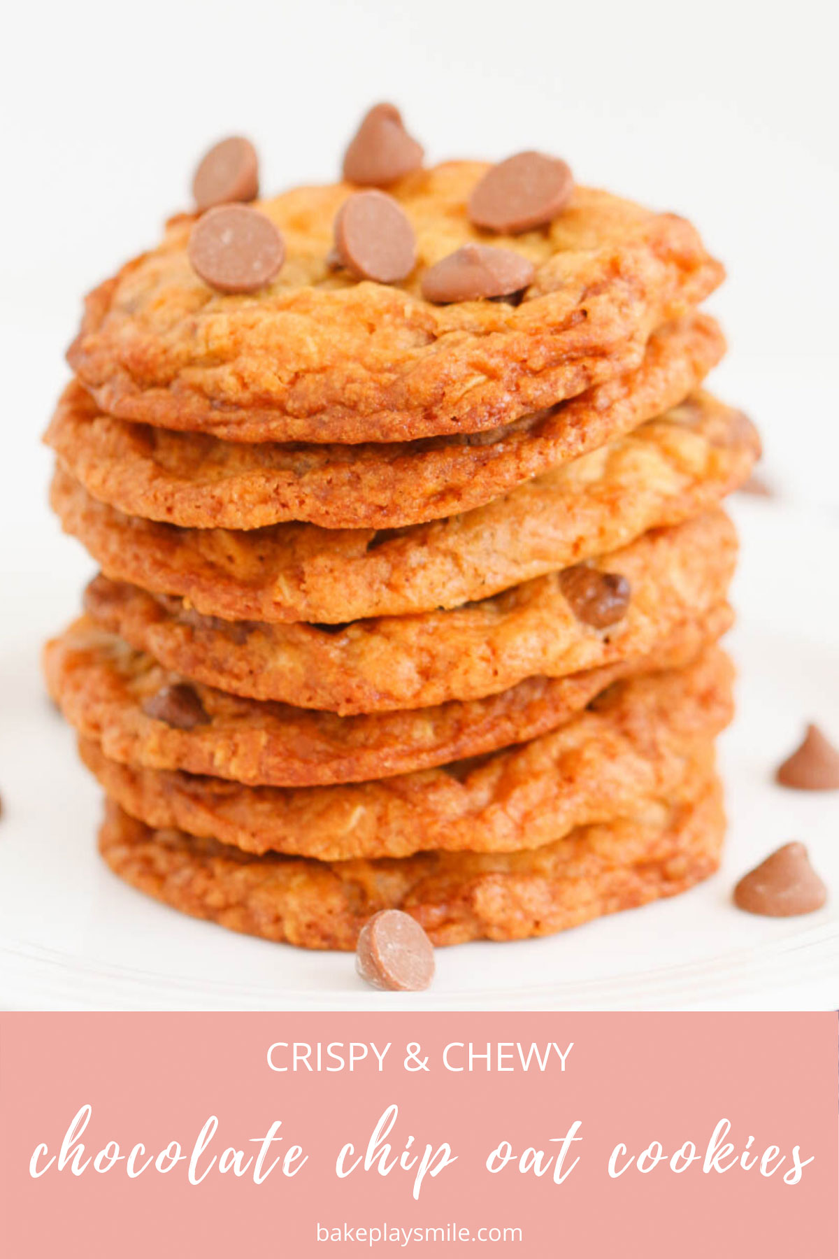 A pile of oat cookies with chocolate chips on a white plate.