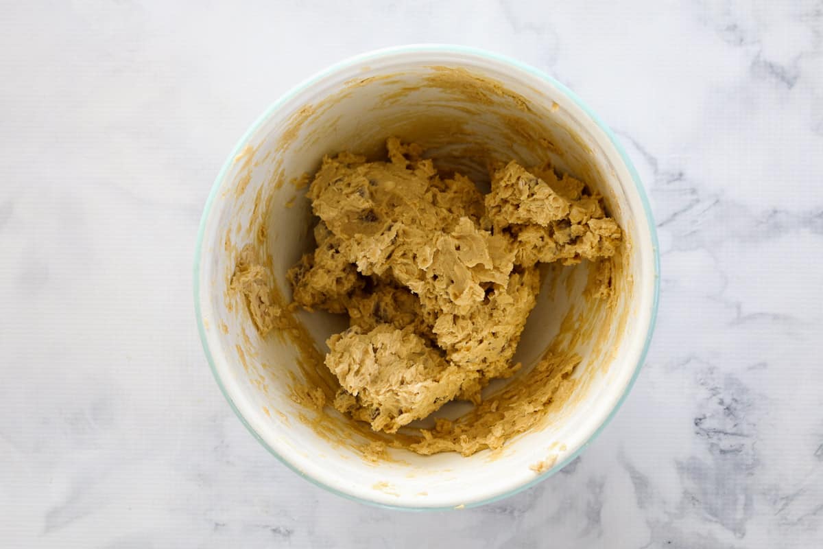 Oat cookie dough mixture in a bowl.