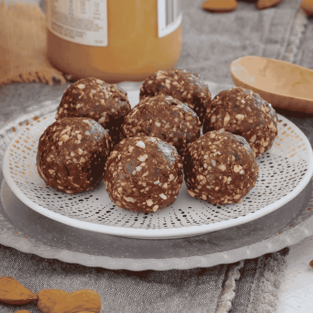 A plate of seven round bliss balls.