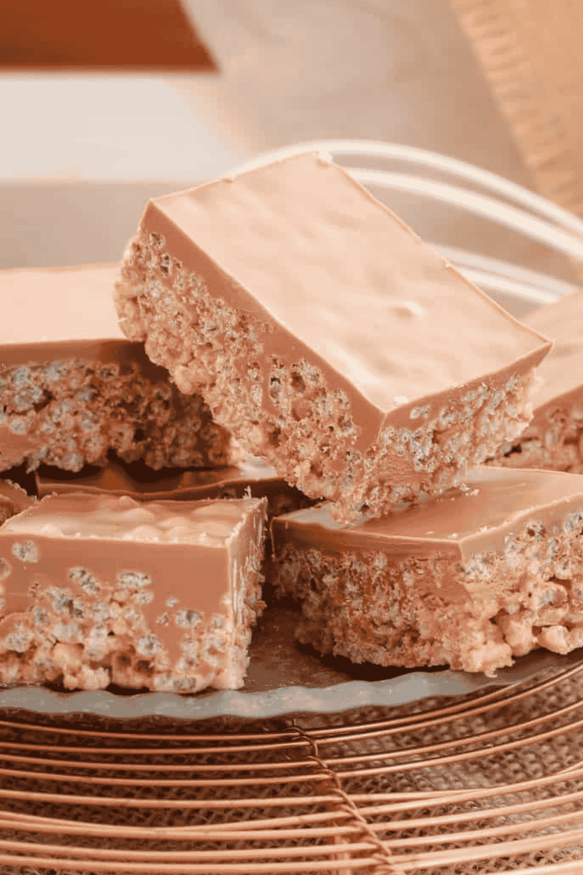 Pieces of Mars Bar Slice stacked together.