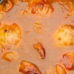 Chicken in a apricot sauce in a crockpot.
