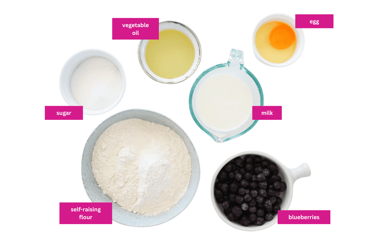 The ingredients for blueberry muffins in small bowls.