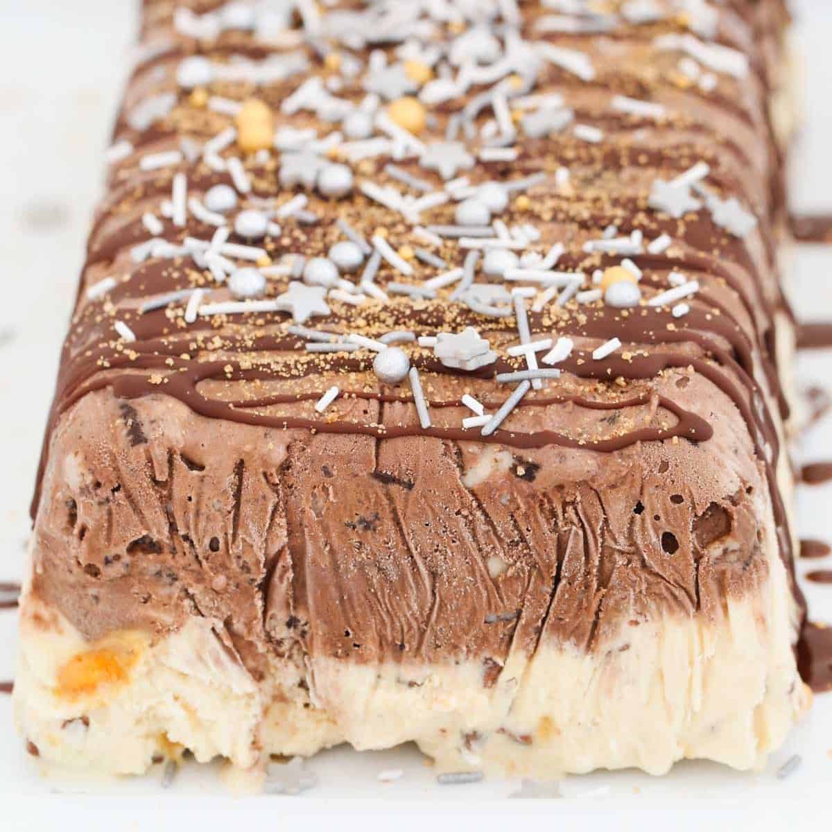 A two layered homemade chocolate and honeycomb ice cream cake.