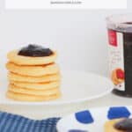 A Pinterest image of a stack of pikelets with the title Pikelets