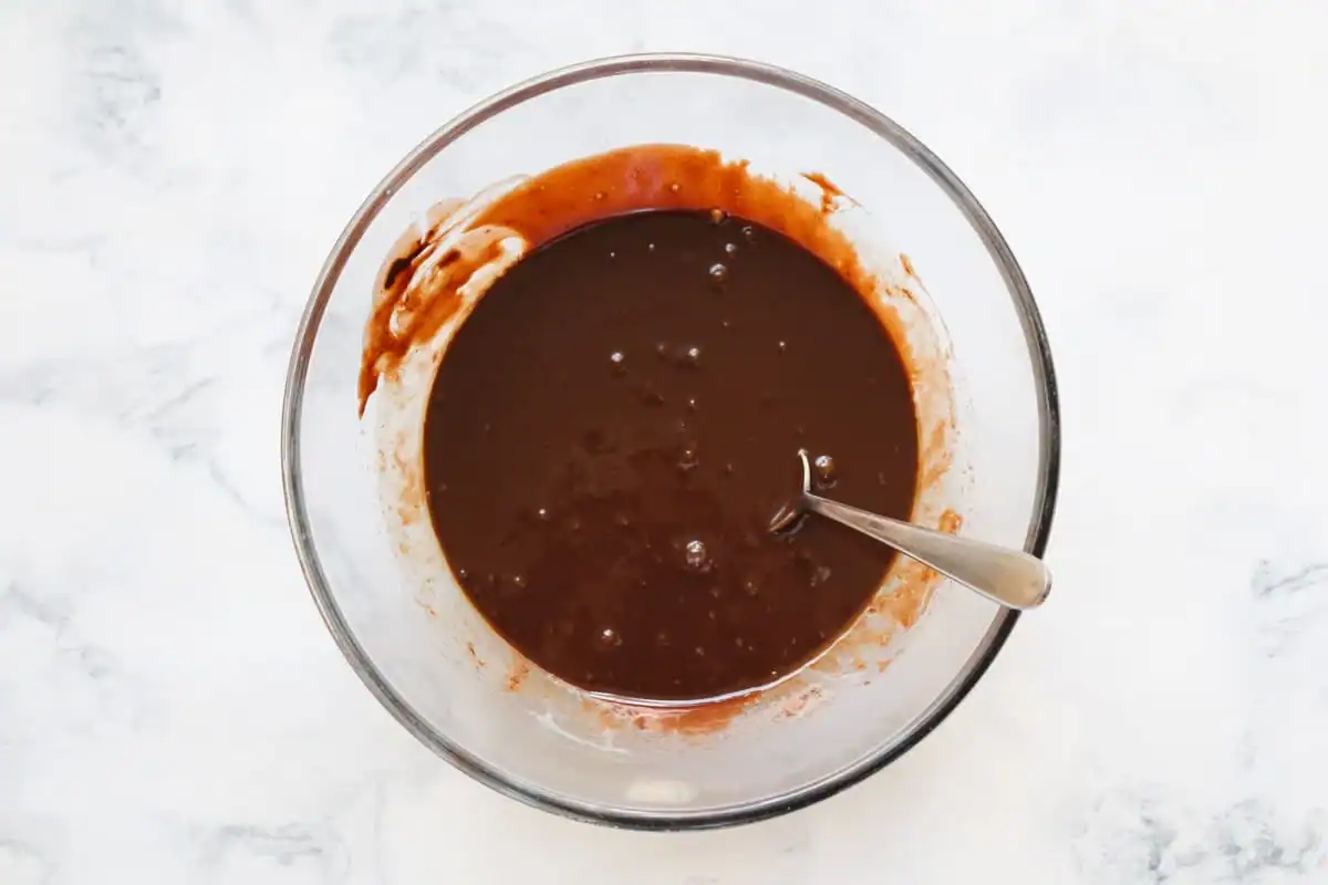 A bowl of melted chocolate.