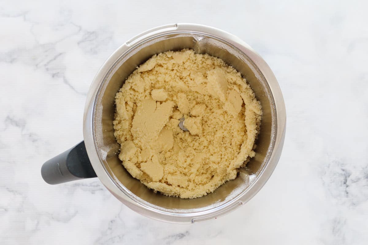 Flour, caster sugar and butter processed to resemble breadcrumbs in a Thermomix bowl.