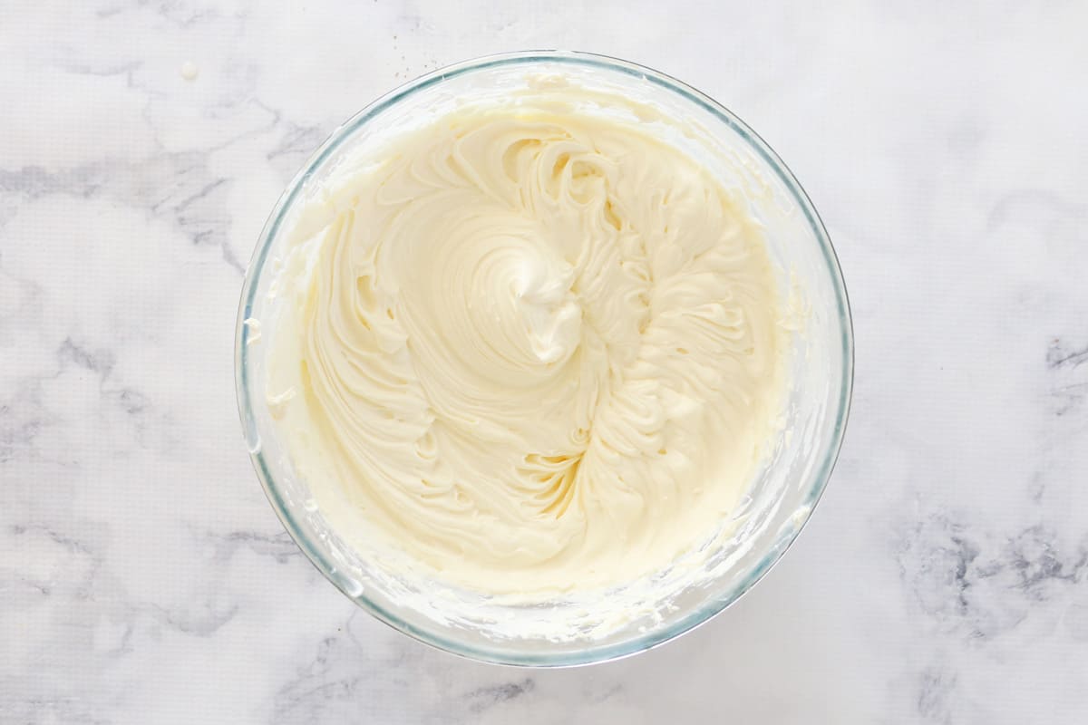 Vanilla cheesecake mixture in a bowl.