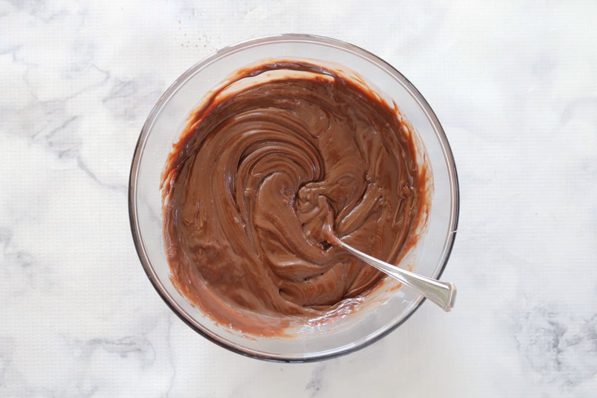 Chocolate fudge mixture in a bowl.