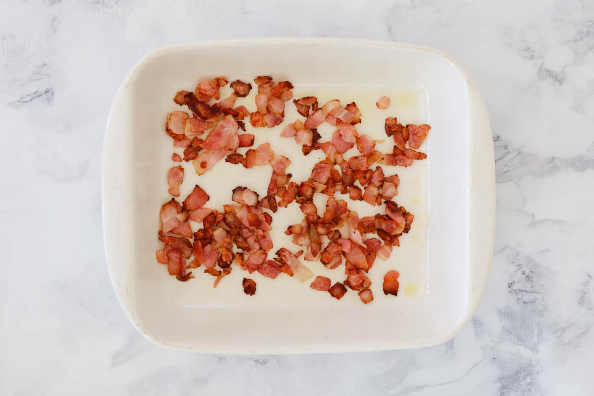 Cooked bacon in an ovenproof  baking dish.