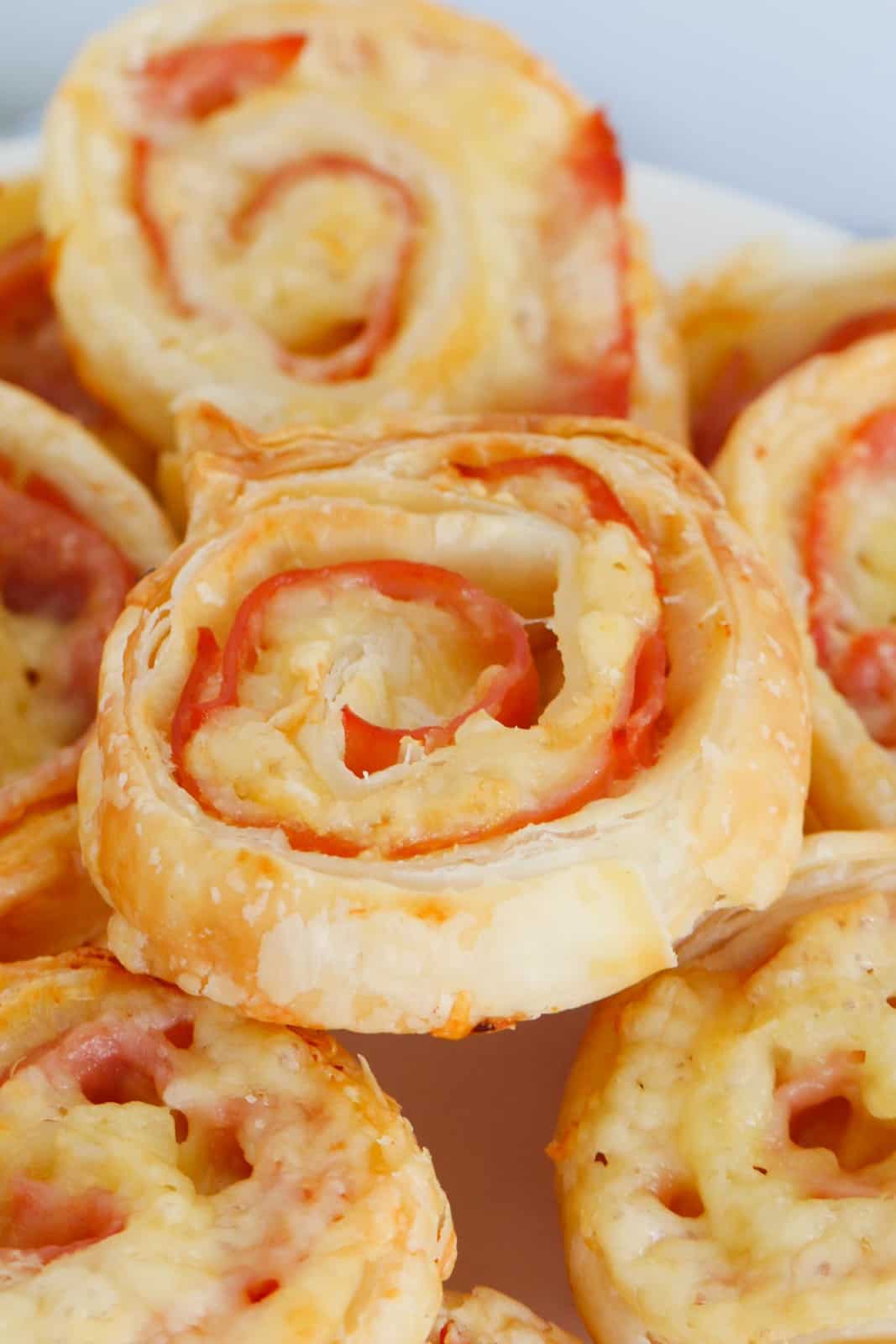 Cheese and ham pinwheels made with puff pastry.