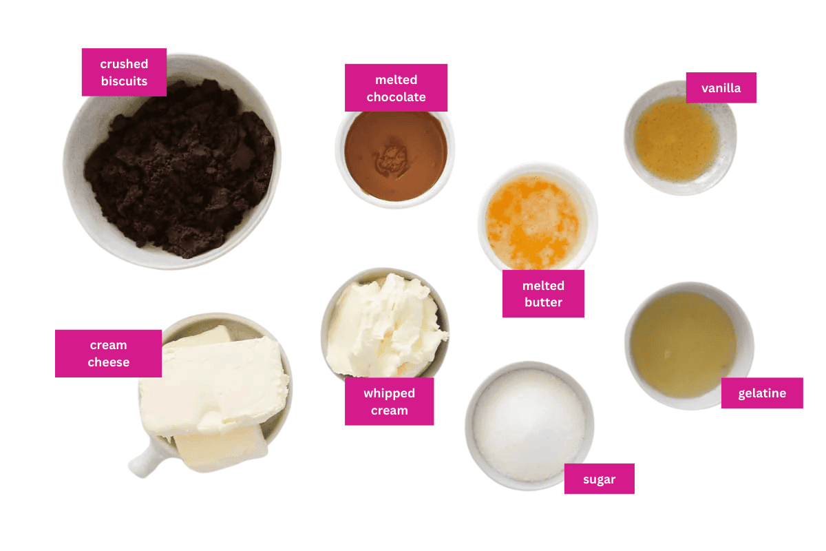 The ingredients for a chocolate cheesecake in small bowls. 
