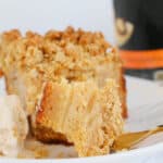 A serve of Apple Crumble Cake with some on a fork
