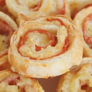 Cheese and ham roll ups made with puff pastry.