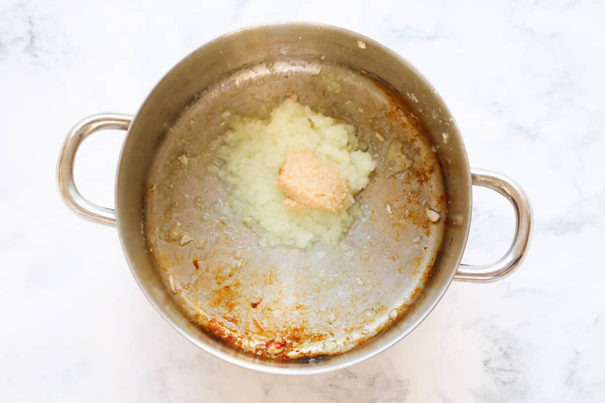 Garlic and onion in a saucepan.