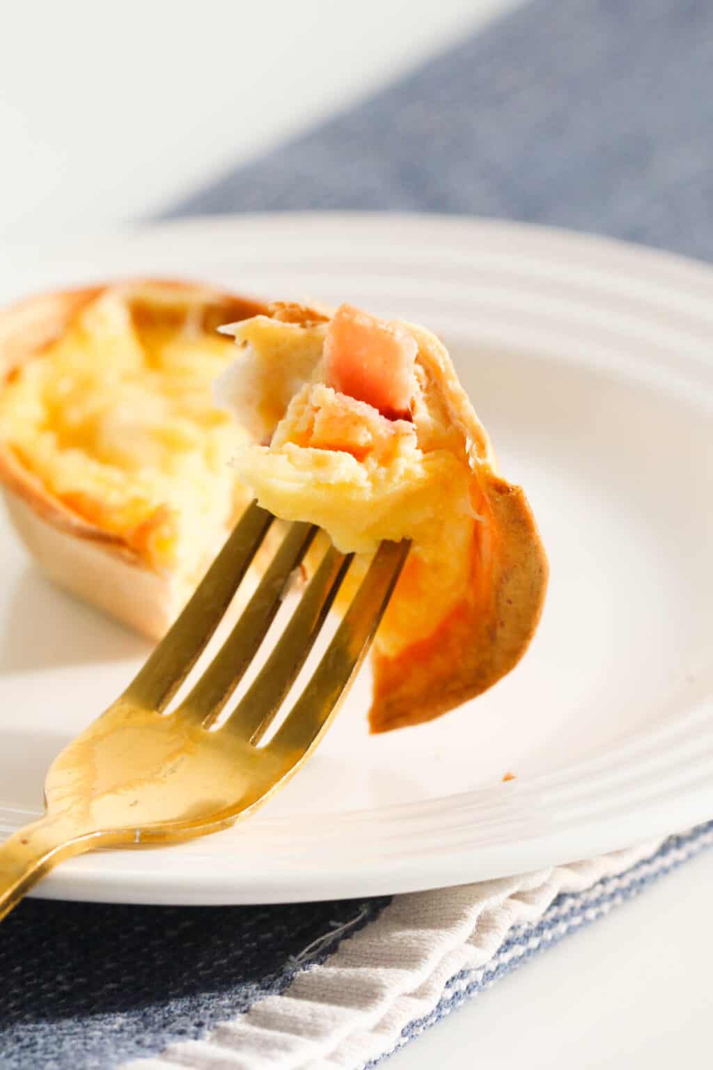Cheesy Egg and Bacon Tortilla Quiches - Bake Play Smile