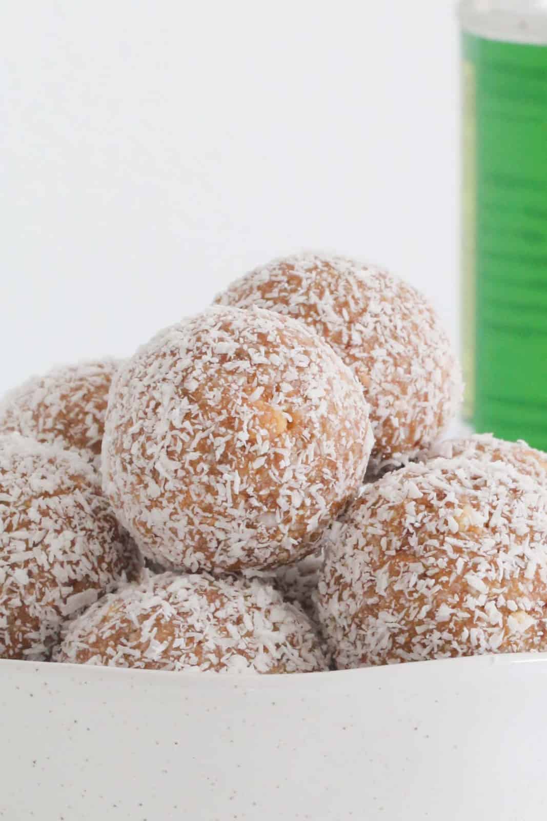 A close up of coconut coated Milo balls.
