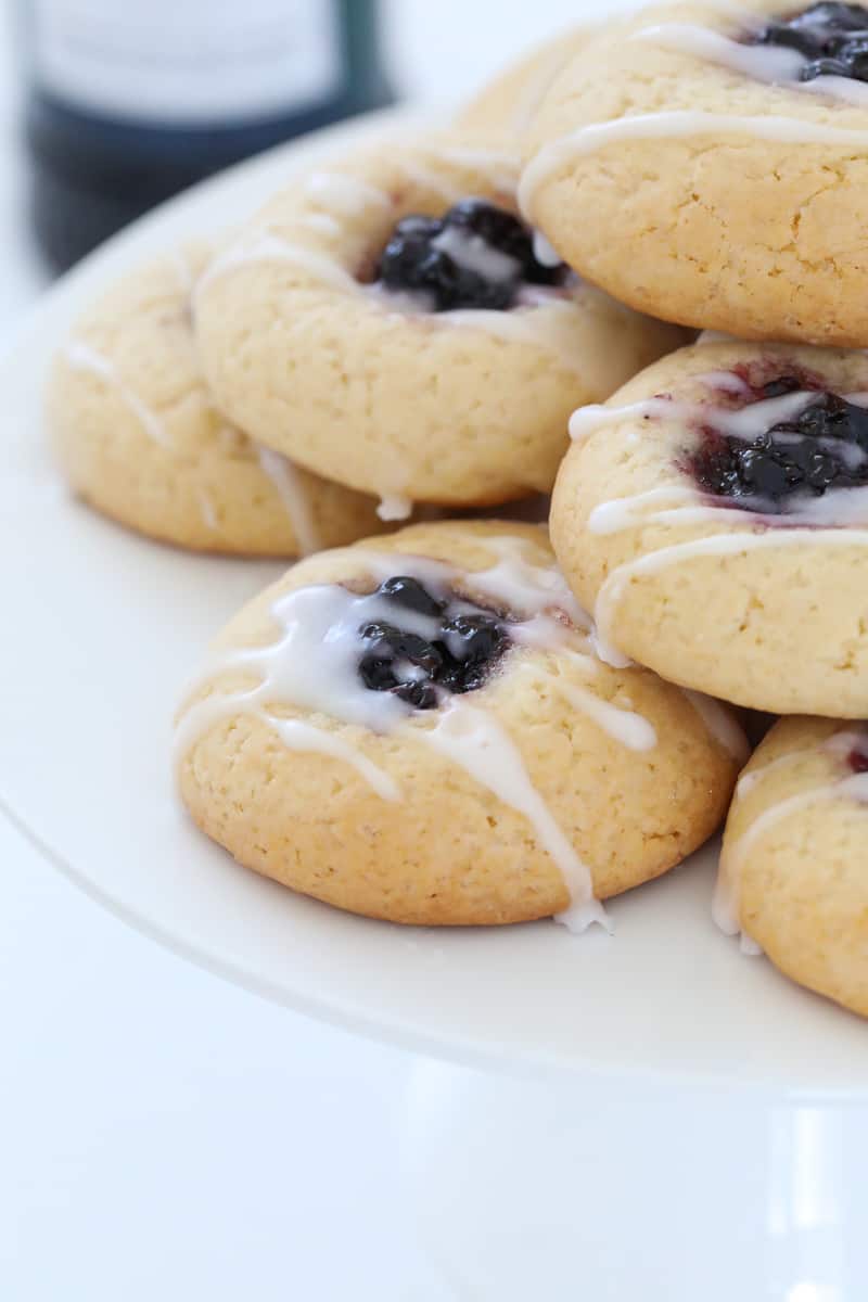 A close up of lemon drizzle and blueberry jam in cookies.