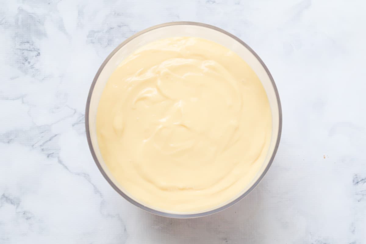 A layer of custard in a bowl.