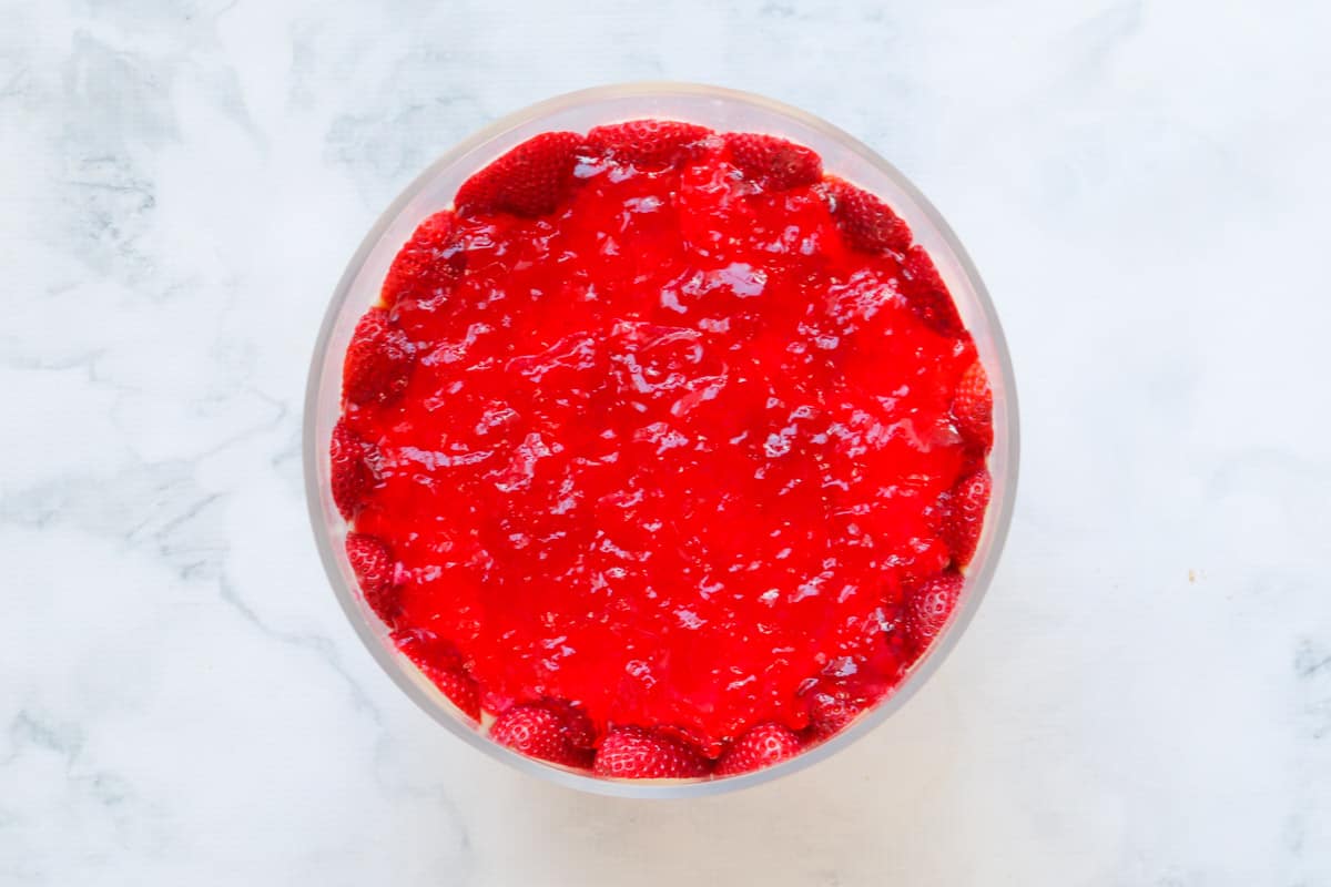 Jelly and strawberries in a bowl.