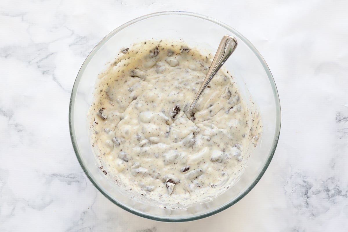 Cookies and cream fudge mixture in a bowl.