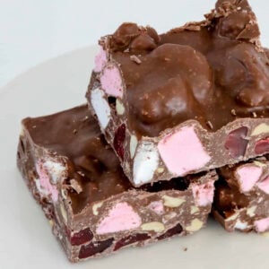 Milk chocolate coated marshmallows, nuts and lollies.