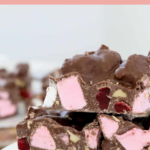 A pile of Rocky Road pieces filled with marshmallows, peanuts and raspberry lollies