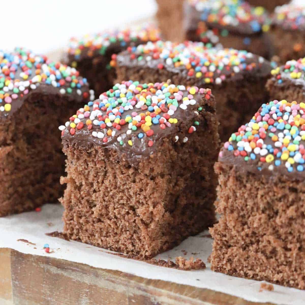 finished chocolate cake on a wooden board