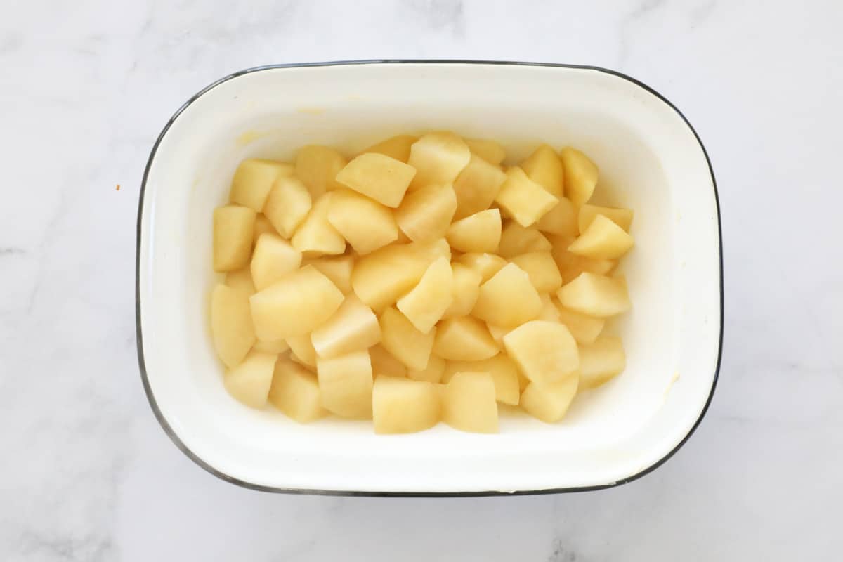 Stewed apple in a baking dish.