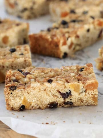 Muesli bars without nuts being chopped on a board.