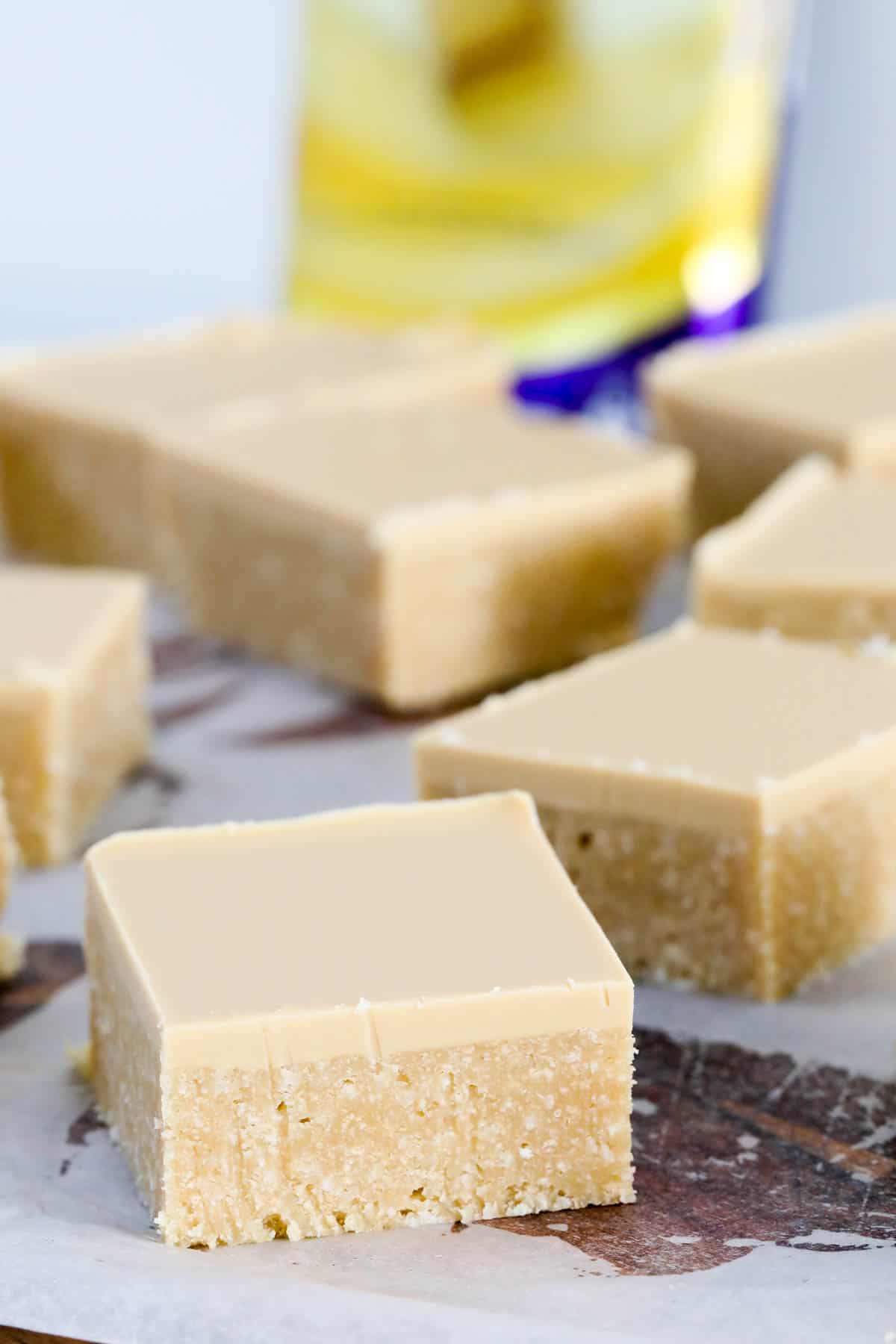 Small squares of caramilk slice on a board