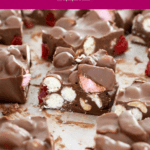 Malteser rocky road cut into pieces on a chopping board.