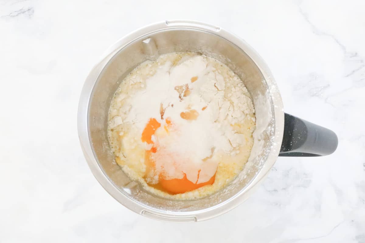 Egg, flour and sugar in a Thermomix bowl.
