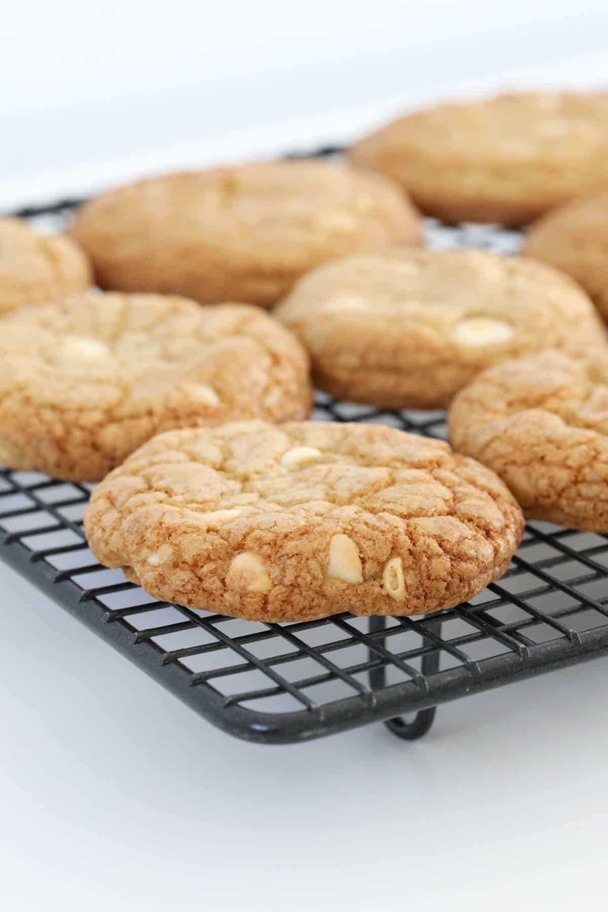 Golden baked cookies on a wire rack