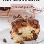 A batch of Hot Cross Buns, studded with chocolate chips throughout.