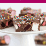 A white cake stand with pieces of Easy Rocky Road with Licorice Allsorts