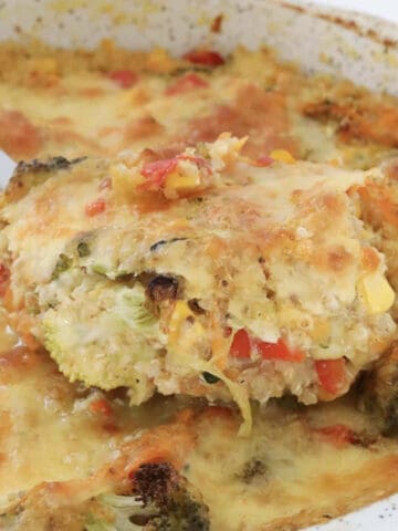 A spoonful of quinoa bake with vegetables.