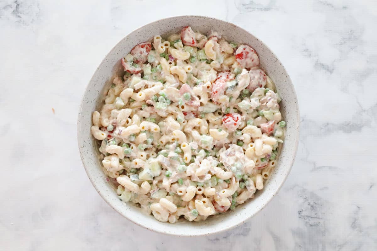 Finished tuna pasta salad in a white bowl