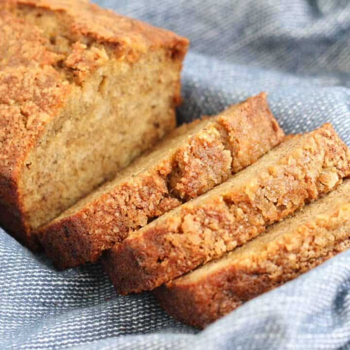 Pieces of moist banana bread with a crunchy sugar top.